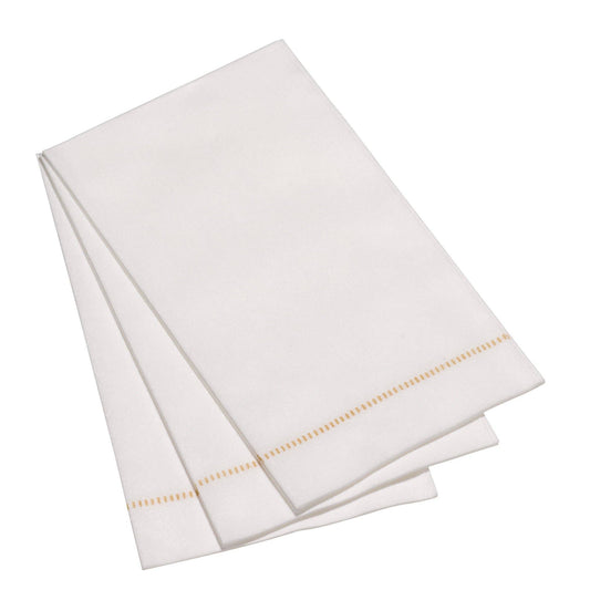 The Napkins hemstitch guest napkins stacked in rectangular pile, white linen with tan stitched detail