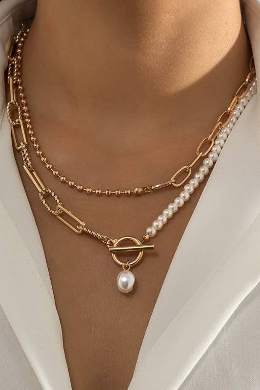 JOSSLYN by wall to wall pearl mix double layer toggle necklace with pearl strand, textured beaded chain, and pearl pendant detail