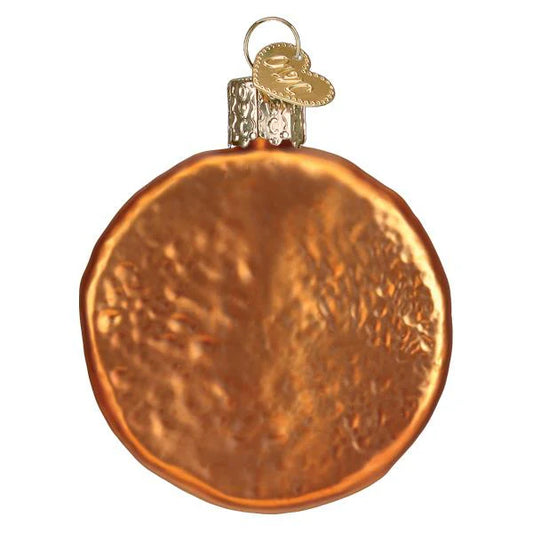 A sparkling, round orange Old World Christmas Sourdough Bread Ornament with a textured surface and gold cap, finished with a small gold heart-shaped tag—an ideal gift from Old World Christmas for anyone passionate about baking or appreciating the art of sourdough bread.