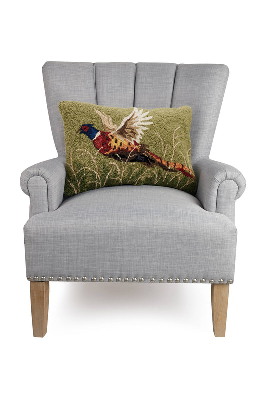 Peking Handicraft Pheasant Hook Pillow displayed on gray upholstered wingback chair