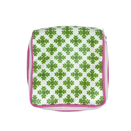Laura Park Jewelry Case top view with green damask pattern on white, pink trim, and handles