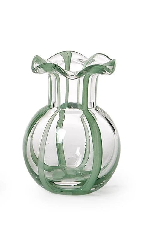 The Two's Company Ruffled Ribbon Vase by Two's Company is a clear glass vase with vertical green stripes, a wavy flared rim, round body, and narrow neck—ideal for decorative arrangements.