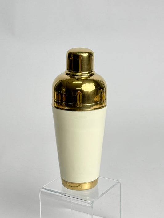 India Handicrafts hand-painted cocktail shaker with cream body, brass cap and base