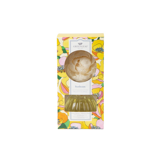 Greenleaf Gifts Sunbeam Flower Diffuser packaging displayed flat, showing colorful yellow-pink floral box with ceramic diffuser and glass bottles