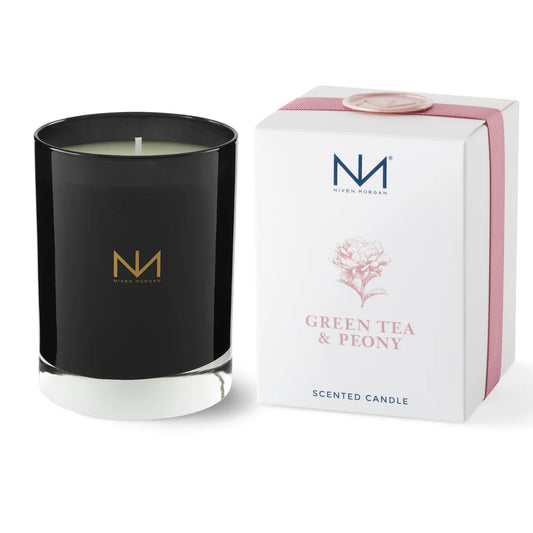 Niven Morgan Green Tea & Peony scented candle in black glass with white base and white box with pink ribbon