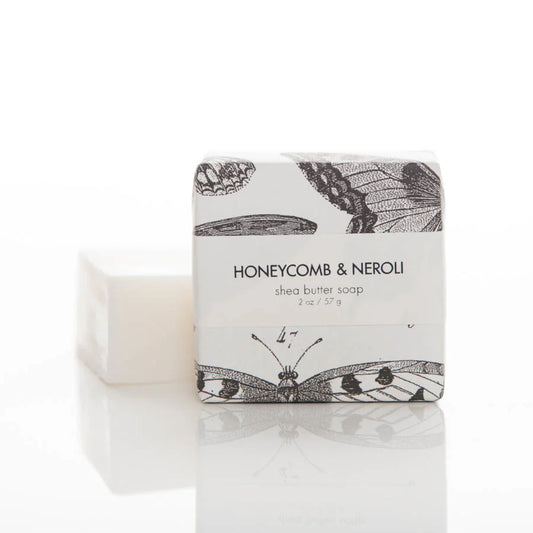 Formulary 55 petite Honeycomb & Neroli cream shea butter soap with botanical-printed white wrapper band