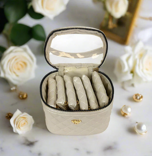 PurseN Getaway Jewelry Case pearl opened to reveal lined compartments holding jewelry rolls