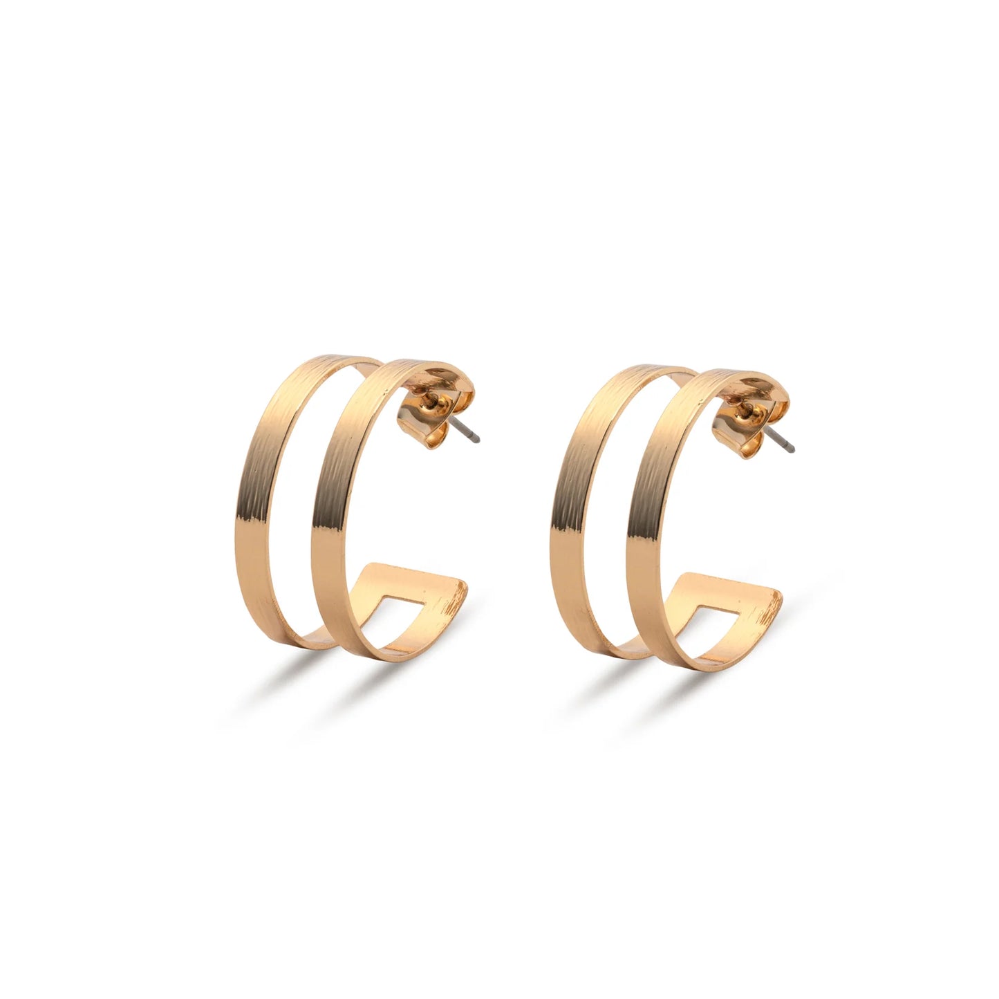 The Leslie Curtis Posey Earrings by Leslie Curtis are a pair of gold-tone geometric hoop earrings featuring a double bar design and secure stud post, shown against a white background. These striking 1.5 inch earrings bring modern elegance to any ensemble.