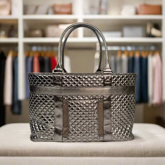 PurseN Travel Tote Bronze quilted tote displayed on shelf showing front pocket detail