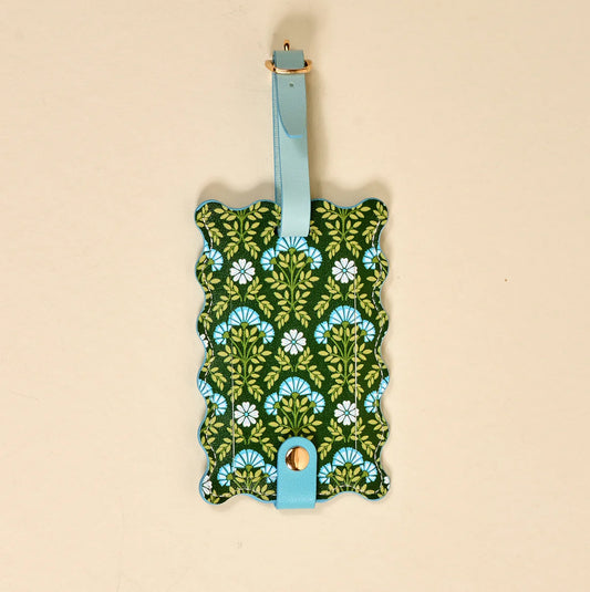 The Darling Effect Jetsetter Luggage Tag with scalloped edges, green damask pattern with white and blue flowers and light blue strap