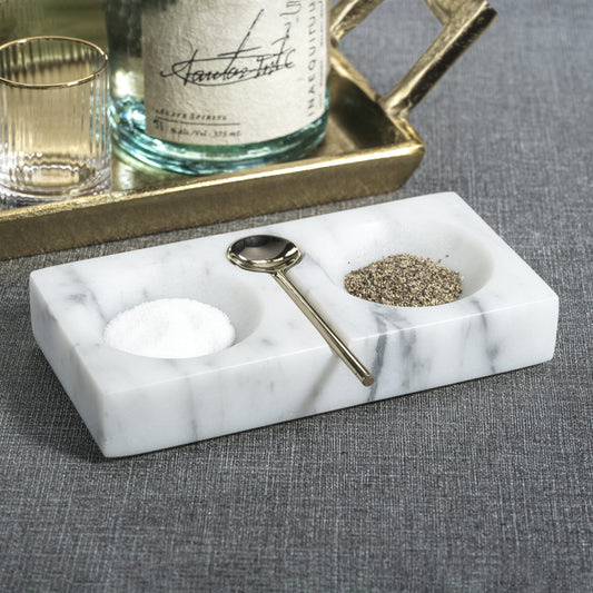 Zodax Marble Salt and Pepper Dish styled with salt, pepper, and spoon on table with glassware
