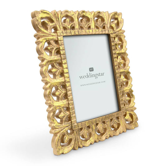 Gold ornate wood Weddingstar picture frame shown at angle with empty mat