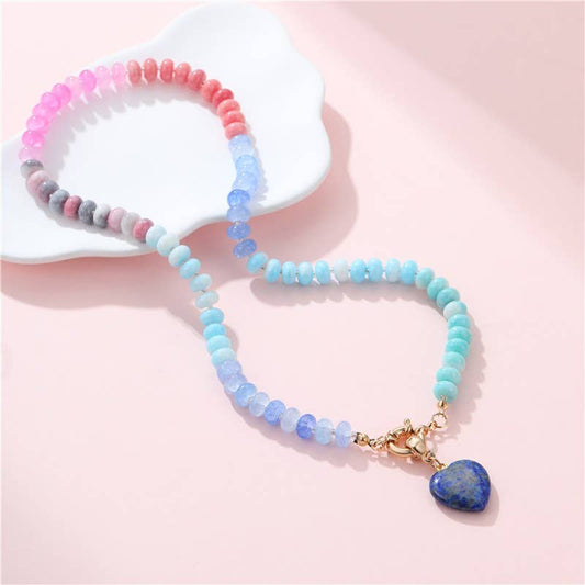JOSSLYN beaded necklace with blue and turquoise gradient beads and lapis lazuli heart pendant