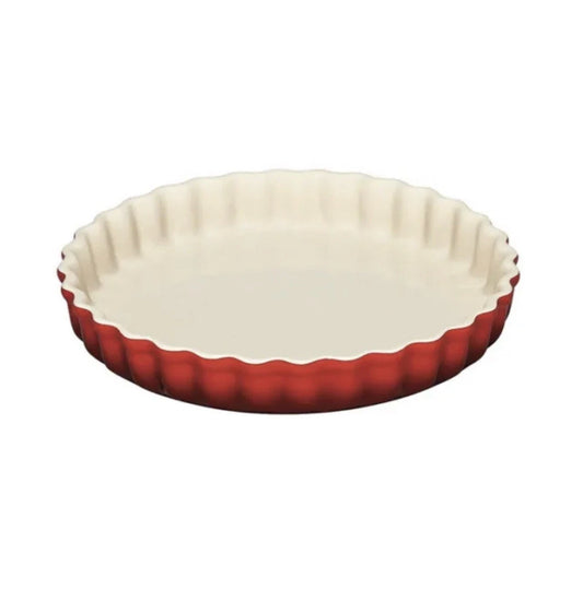 Le Creuset Cake Pan Tradition 28 cherry red and cream stoneware cake pan with scalloped edge