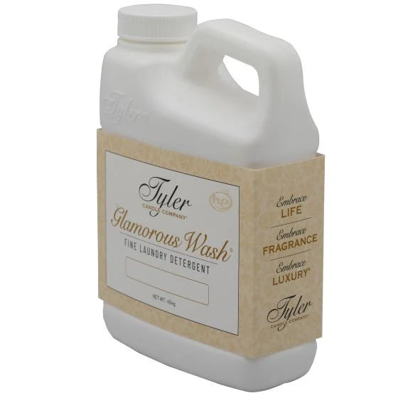 Tyler Glamorous Wash 16 oz fine laundry detergent in white plastic jug with kraft paper band