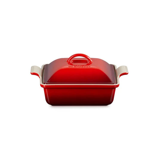 Le Creuset Heritage square casserole in cherry red with matching lid and cream handles