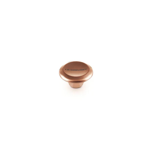 Le Creuset Signature medium knob in copper stainless steel, angled view