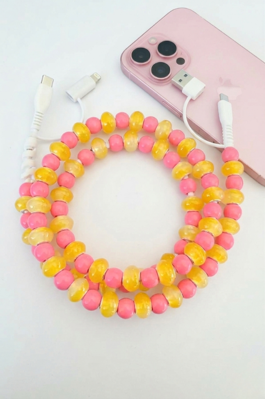 Nash Grey Pink and Yellow Beaded Charger with alternating hot pink and yellow beads, styled with pink phone