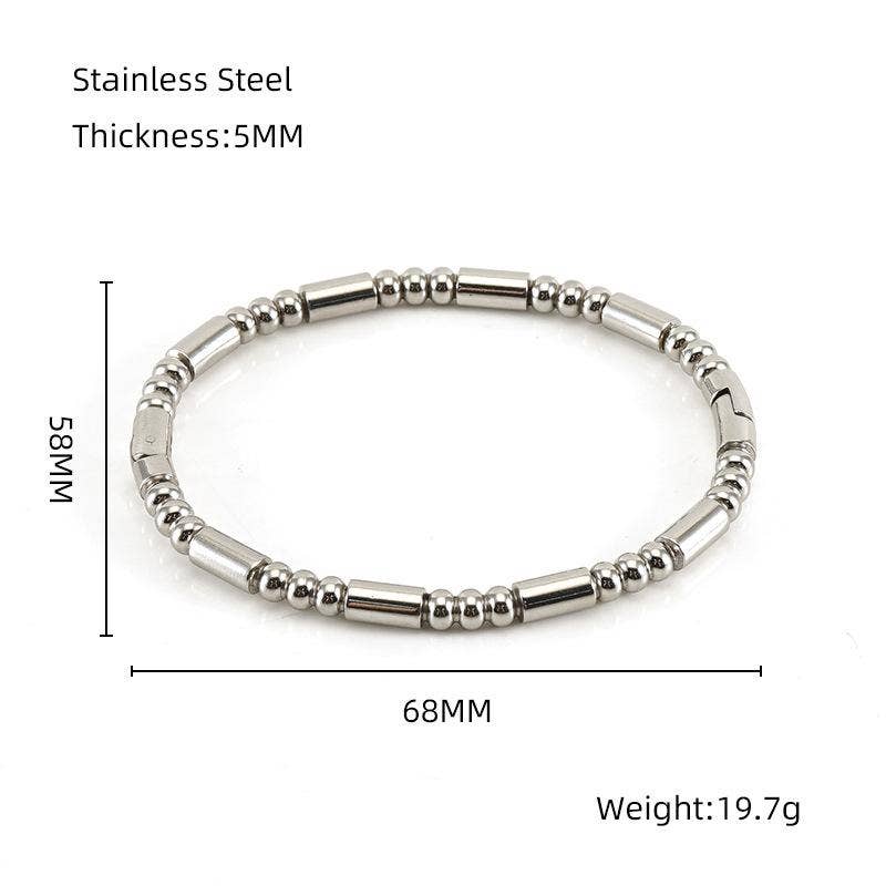 Add a touch of sophistication to your look with the Mio Queena - Multi-style 18K Gold-plated Stainless Steel Bangle. Expertly crafted from durable stainless steel, this elegant bangle features small cylindrical beads and a radiant 18K gold plated finish. With dimensions of 5mm thickness, 68mm width, and 58mm height, it weighs just 19.7 grams—making it ideal for daily wear or as a thoughtful jewelry gift for someone special.