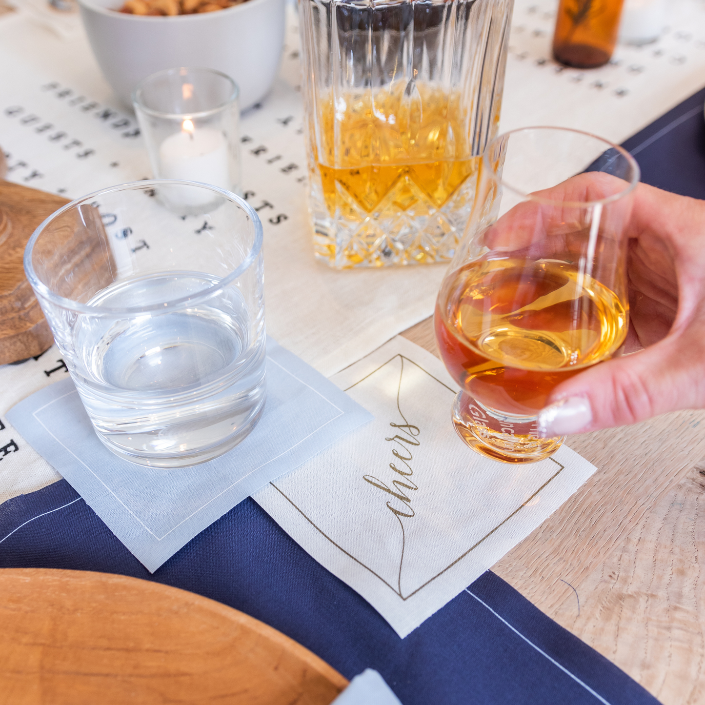 Table Theory (Formerly Toasting with Tara) - Cotton Cocktail Napkin Roll: Golden Salute (Gold "Cheers")