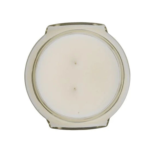 Tyler Candle Company 22oz cream candle in glass jar with beige lid, top view