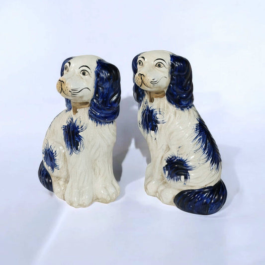 AA Importing blue and white ceramic Staffordshire dog pair, three-quarter view profile
