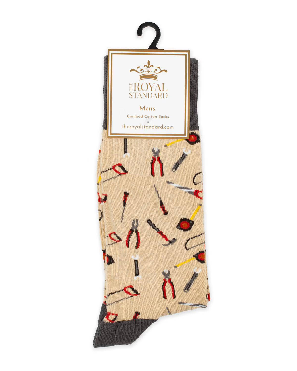 Brighten up your wardrobe with The Royal Standard Men’s Socks in beige, accentuated by gray toes and heels and decorated with a vibrant pattern of assorted hand tools—such as pliers, screwdrivers, and wrenches—in shades of red, gray, and black. Ideal as a whimsical gift for the handyman or sock lover in your life, each pair comes labeled “The Royal Standard Mens Combed Cotton Socks.”.