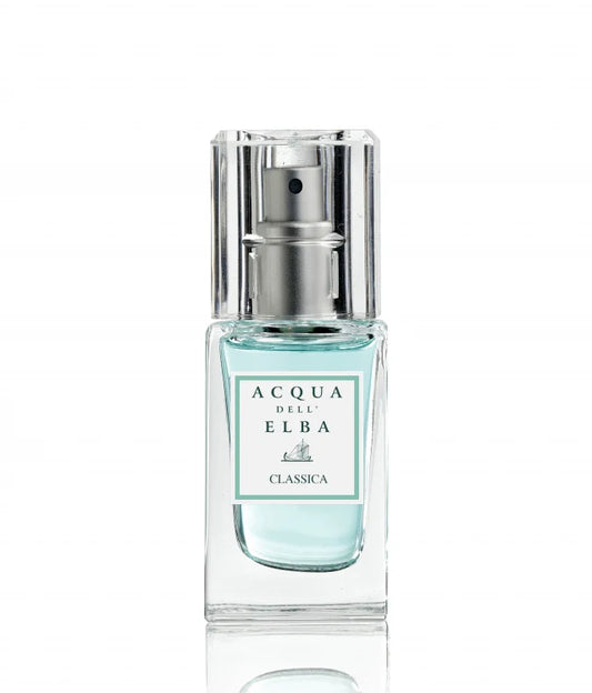 Acqua Dell Elba Classica travel size perfume bottle, 0.5 oz, with light turquoise liquid and silver spray top