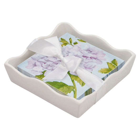 Sophistiplate Ceramic Wave Napkin Tray in cream with purple floral cocktail napkins tied with white ribbon