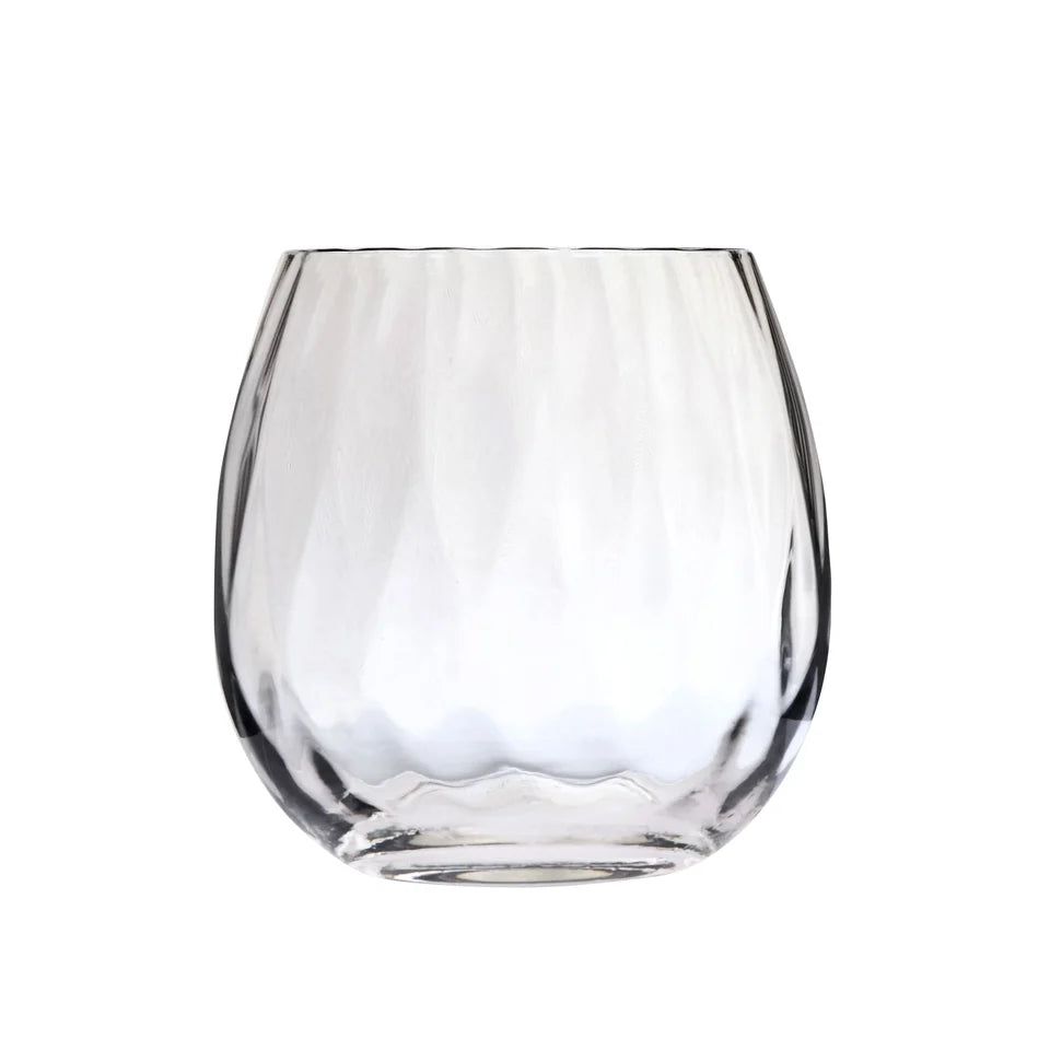 The Skyros Designs "Abigail" Stemless Wine Glass features a clear, empty form with a rounded, slightly tapered silhouette and a textured, wavy pattern on its surface, displayed against a plain white background.