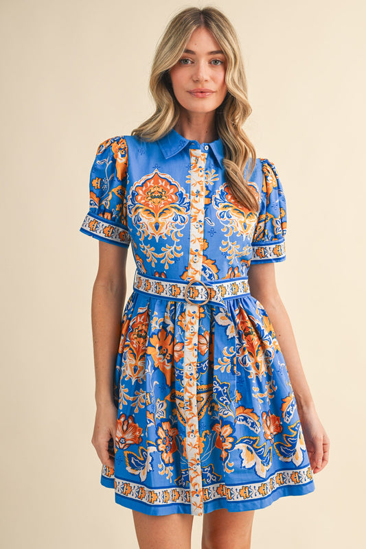 &Merci Floral Paisley Button Down Belted Mini Dress in blue with orange and cream baroque pattern, front view