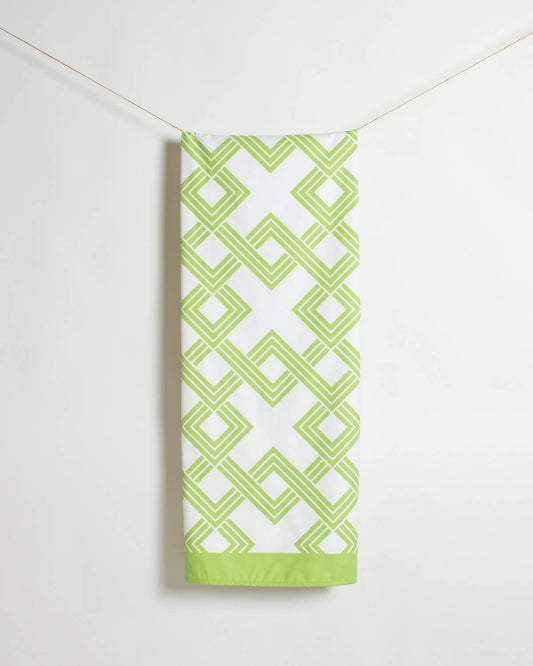 The Royal Standard Savannah Giant Beach Towel detail showing geometric diamond lattice pattern in green and white