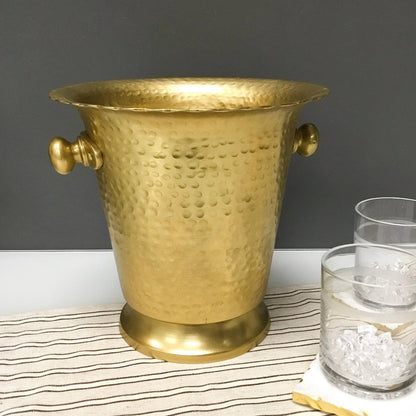 India Handicrafts Ham Gold wine cooler with textured surface and brass handles, styled with glasses