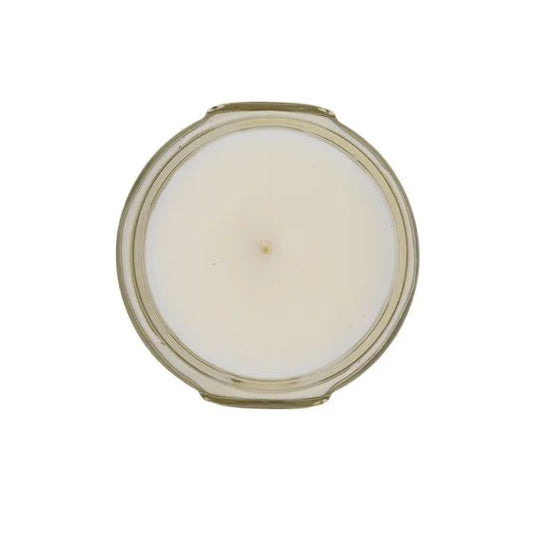 Tyler 3.4 oz scented candle in clear glass container with cream-colored wax and metal lid
