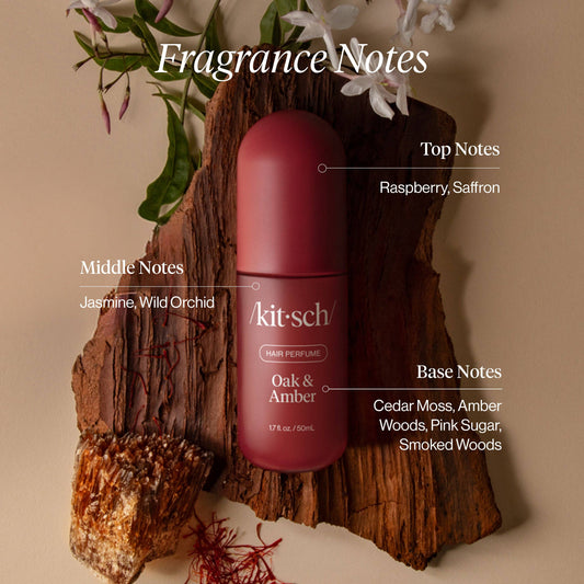 Kitsch Oak & Amber Hair Perfume displayed on wood with fragrance notes infographic