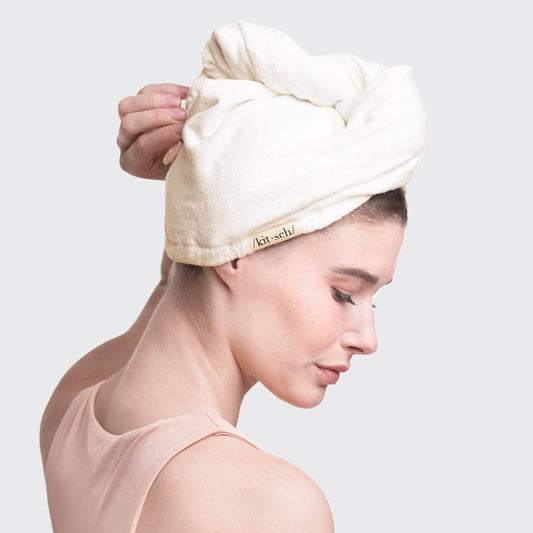Person wearing ivory KITSCH Quick Dry Hair Towel wrapped on head, profile view