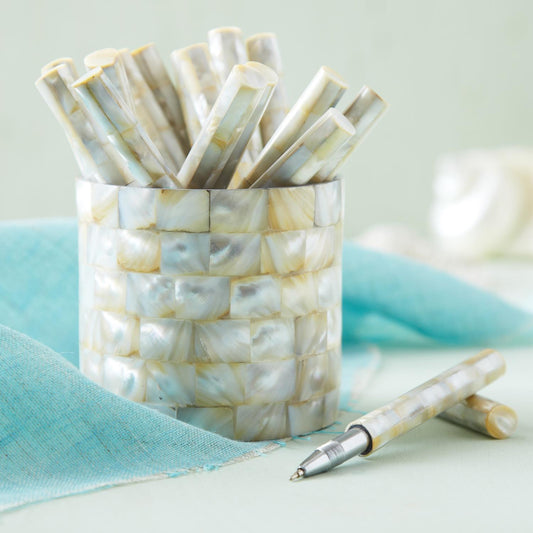 Two's Company Mother of Pearl Covered Pen in cylindrical holder with matching pens fanned inside and one pen displayed separately