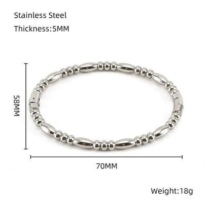 Introducing the Mio Queena - Multi-style 18K Gold-plated Stainless Steel Bangle (FGS) by Mio Queena. This elegant bangle, measuring 5mm thick, 70mm wide, and 58mm high with a weight of 18g, is displayed on a white background with labeled measurements—making it an ideal choice for those searching for timeless jewelry gifts.