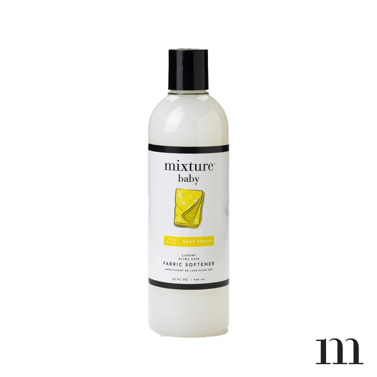 Mixture Baby Fresh Fabric Softener in cream bottle with black cap and yellow fabric graphic on label