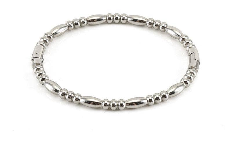 Showcasing the Mio Queena Multi-style 18K Gold-plated Stainless Steel Bangle, this bracelet features a sophisticated design with alternating small round and elongated oval beads arranged in a seamless loop. Set against a white background, this elegant stainless steel piece from Mio Queena makes a timeless and thoughtful jewelry gift.