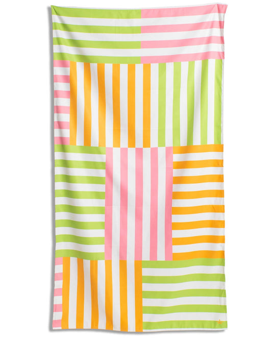 The Royal Standard Freeport Stripe Giant Beach Towel with multicolor blocked stripes in pink, green, orange, yellow, and white