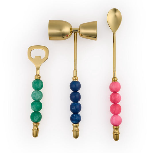 Two's Company Color Pop Bar Set with gold brass bottle opener, jigger, and bar spoon in emerald, navy, and pink