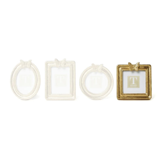 Collection of four Two's Company photo frames in cream and gold with butterfly embellishments