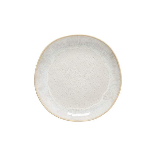 A Casafina “Evissa - Sand Beige” Salad Plate—a round, off-white ceramic plate with a slightly irregular shape and a subtle beige rim from Casafina—is set against a plain white background.