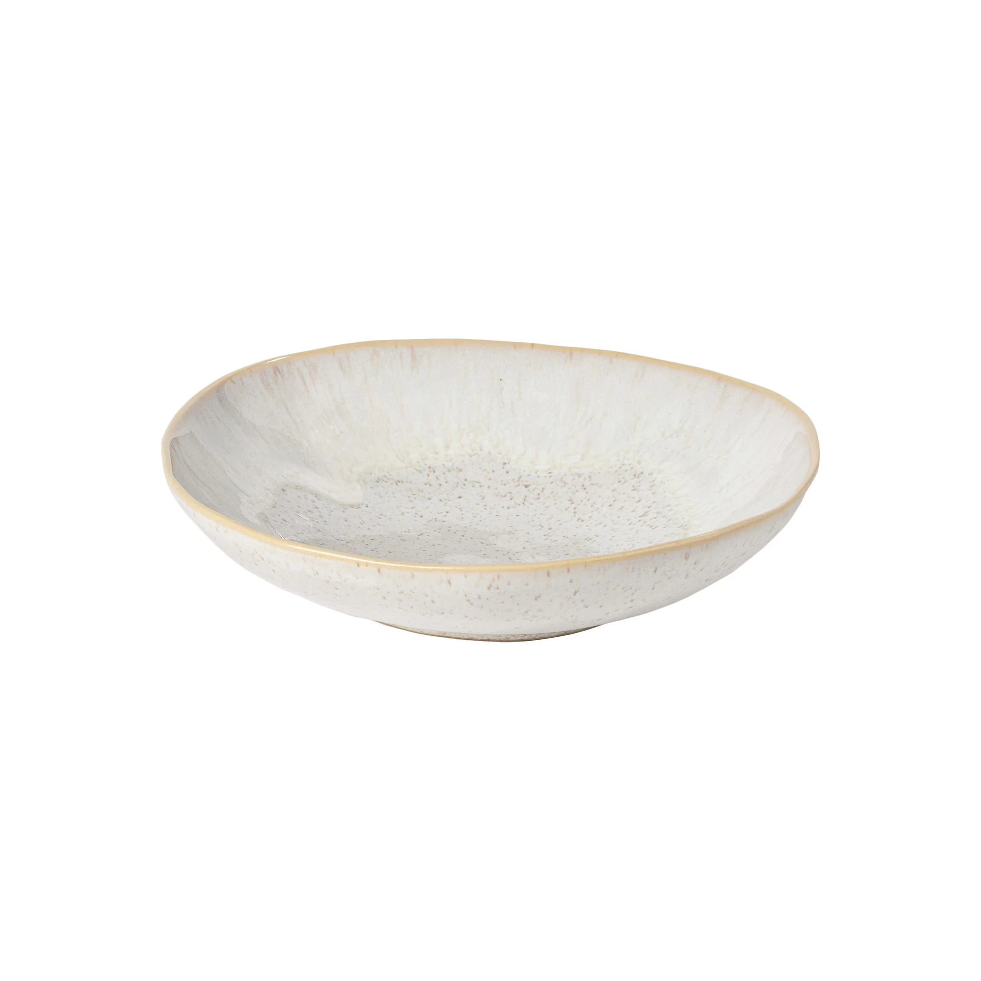 The Casafina “Evissa - Sand Beige” Pasta Bowl by Casafina is a shallow, round ceramic bowl featuring a slightly uneven rim and a speckled white glaze, shown against a plain white background.