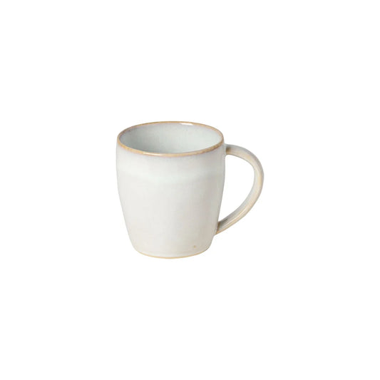 A Costa Nova “Brisa - Salt” mug by Costa Nova, featuring a slightly rounded shape and handle, is shown against a white background.