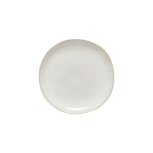 A Costa Nova “Brisa - Salt” Salad Plate by Costa Nova, featuring a plain, round design in white ceramic with a slightly irregular edge, photographed on a white background.