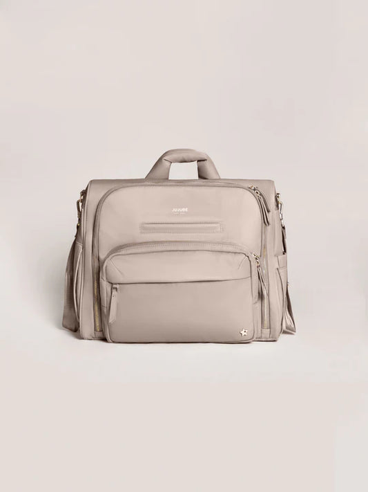 Jujube Satchel Diaper Bag in taupe with multiple pockets and dual handles, front view