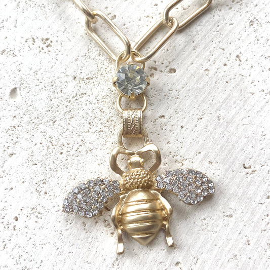 VB&CO Designs Bee Crystal Necklace in matte gold with crystal-topped chain and sparkle-winged bee pendant