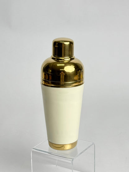 India Handicrafts hand-painted cocktail shaker with cream body, brass cap and base
